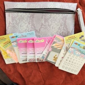 Elegant Purple Makeup Accessory Bag Filled With Nail Art Decals And Gems